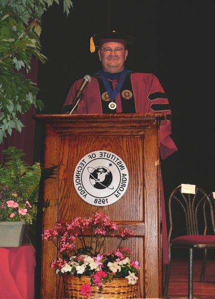 Standing at the podium